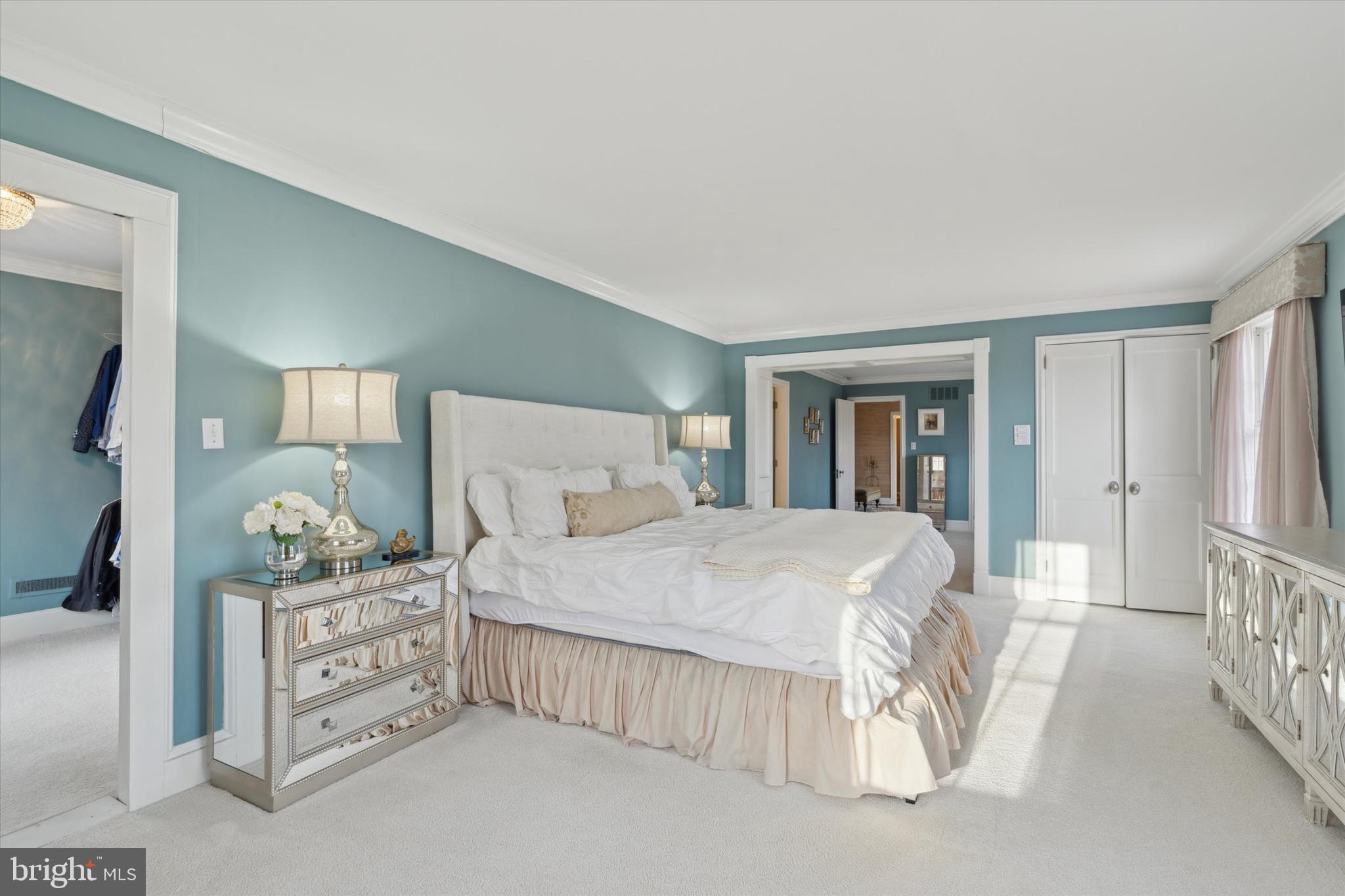 2031 Diamond Rock Road Malvern, PA 19355 - Photo 24 of 51 a bedroom with a bed and a chandelier