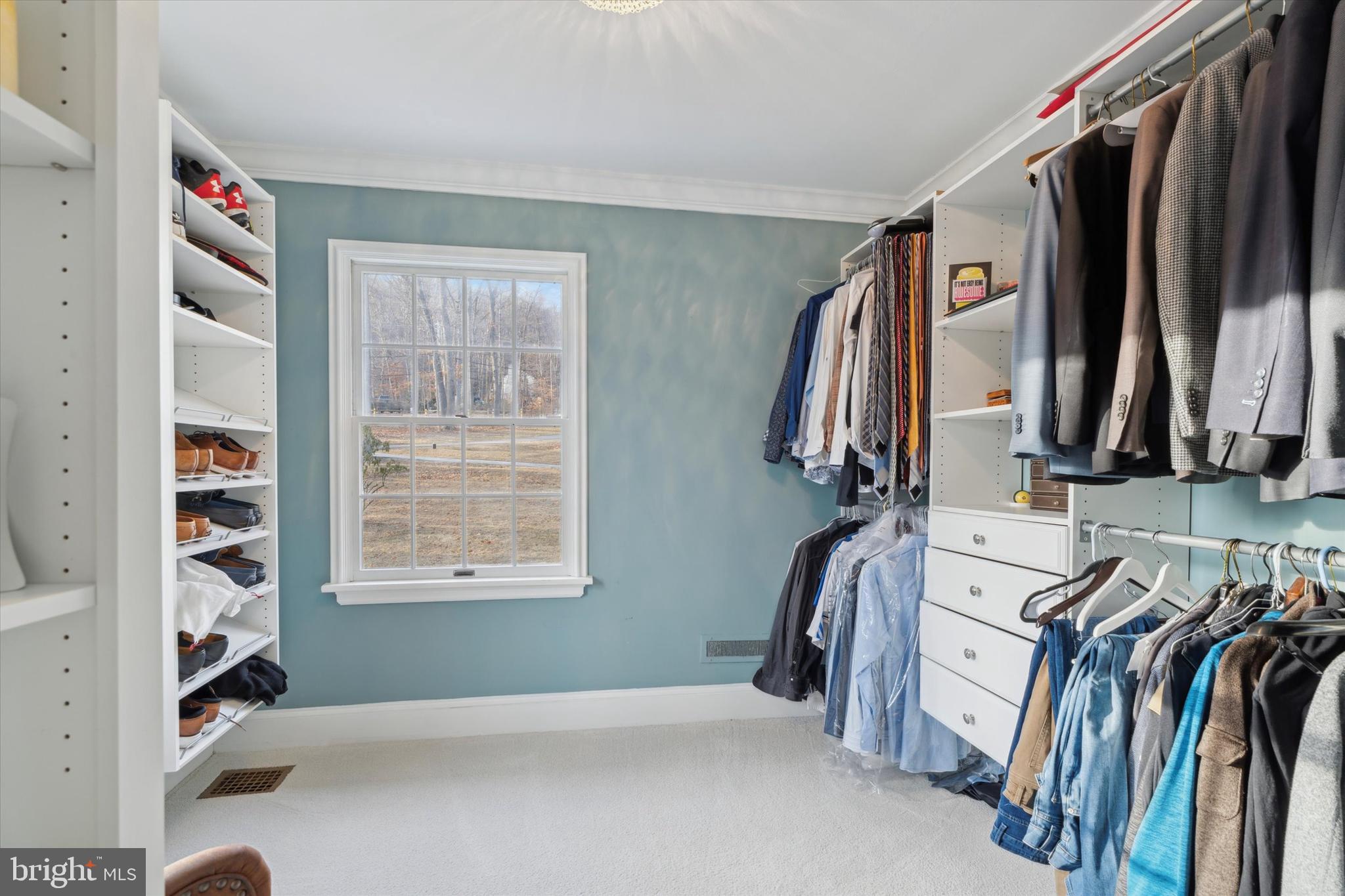 2031 Diamond Rock Road Malvern, PA 19355 - Photo 27 of 51 a view of walk in closet with clothes and shoes