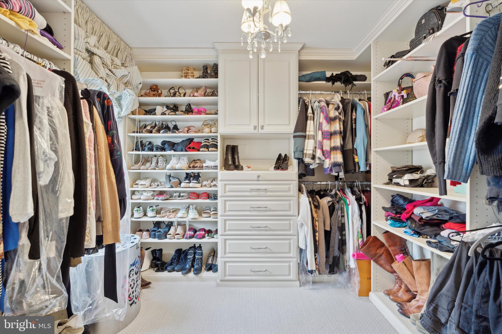 2031 Diamond Rock Road Malvern, PA 19355 - Photo 30 of 51 a view of walk in closet with clothes and shoes