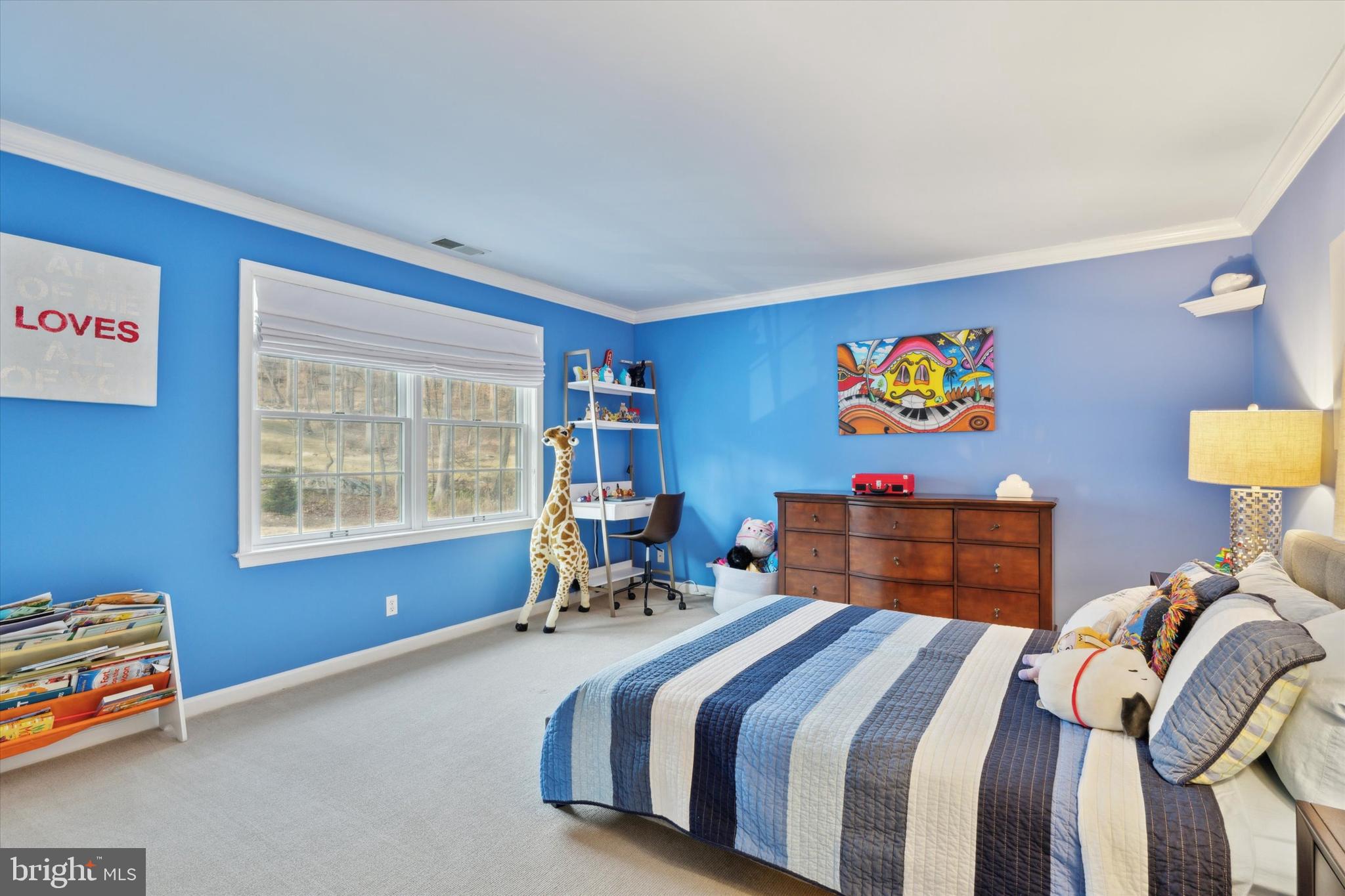 2031 Diamond Rock Road Malvern, PA 19355 - Photo 33 of 51 a bedroom with bed and paintings on the wall