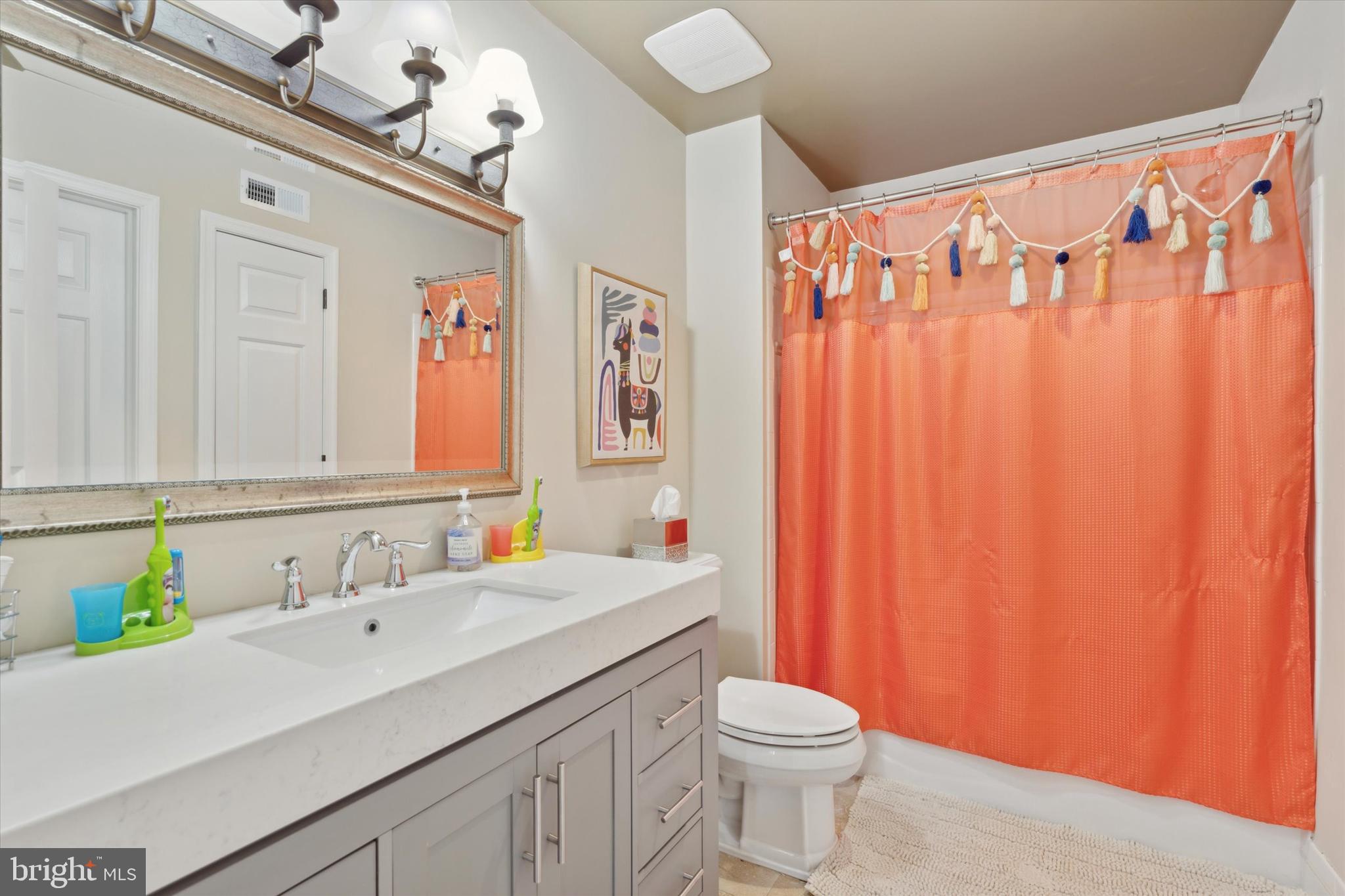 2031 Diamond Rock Road Malvern, PA 19355 - Photo 34 of 51 a bathroom with a sink a toilet and shower curtain