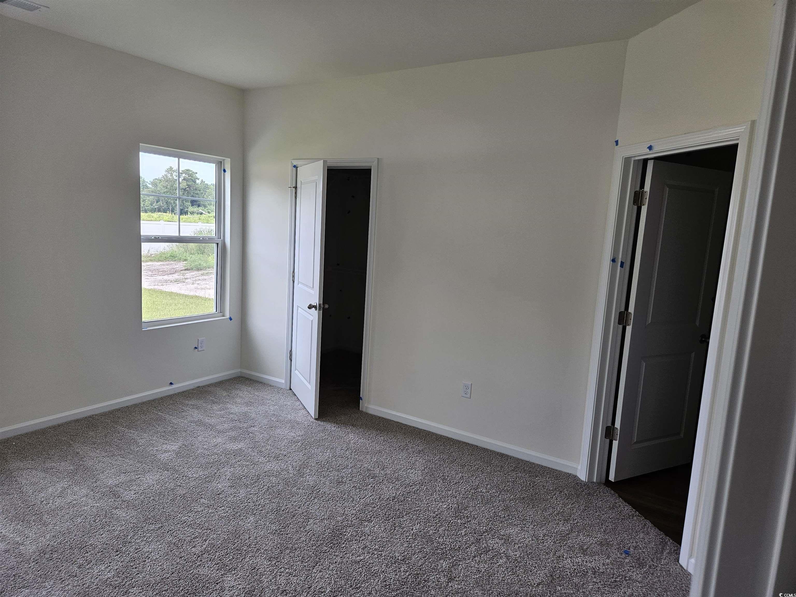 440 Hallie Martin Road Conway, SC 29527 - Photo 5 of 9 Unfurnished bedroom featuring carpet floors