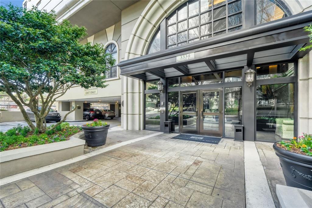 3334 Peachtree Road Northeast, Unit 1208 Atlanta, GA 30326 - Photo 1 of 23 a view of a building with sitting area