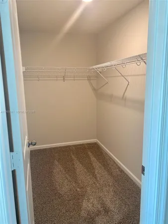 a view of room with washer and dryer