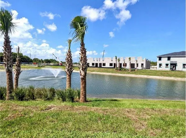 a view of a lake with a house