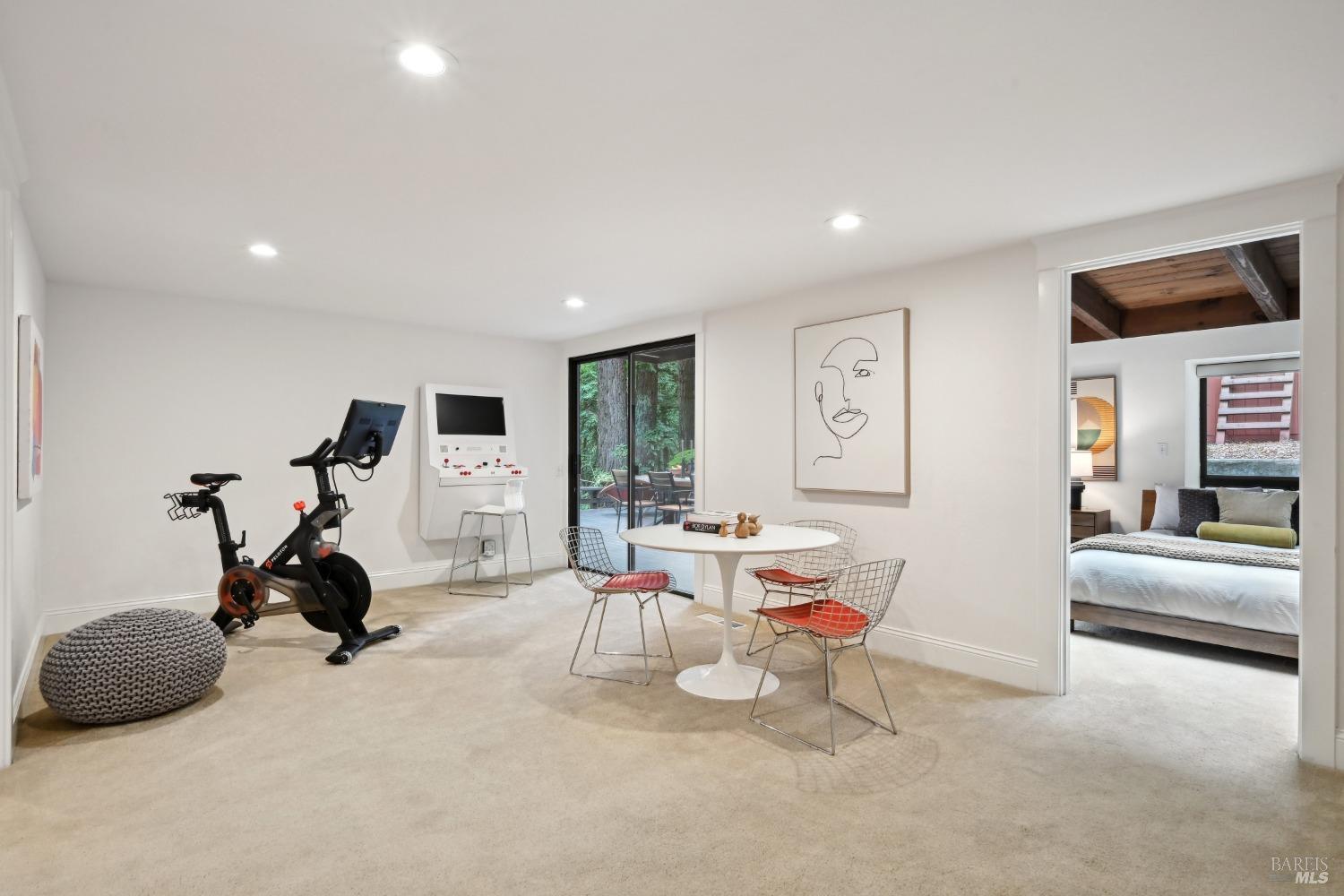 16495 Burl Lane Occidental, CA 95465 - Photo 14 of 31 a room with furniture a white house and gym equipment