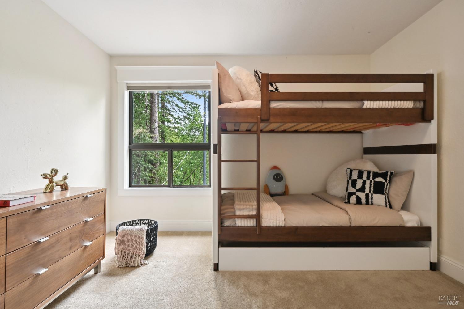 16495 Burl Lane Occidental, CA 95465 - Photo 17 of 31 a bedroom with a bed and a dresser