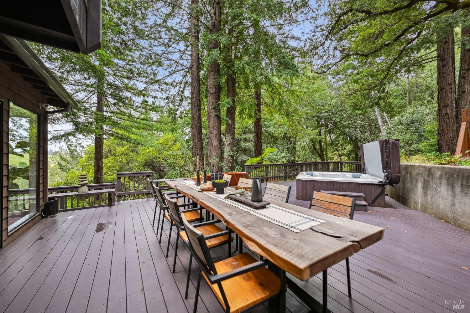 16495 Burl Lane Occidental, CA 95465 - Photo 26 of 31 a view of a patio with table and chairs and wooden floor