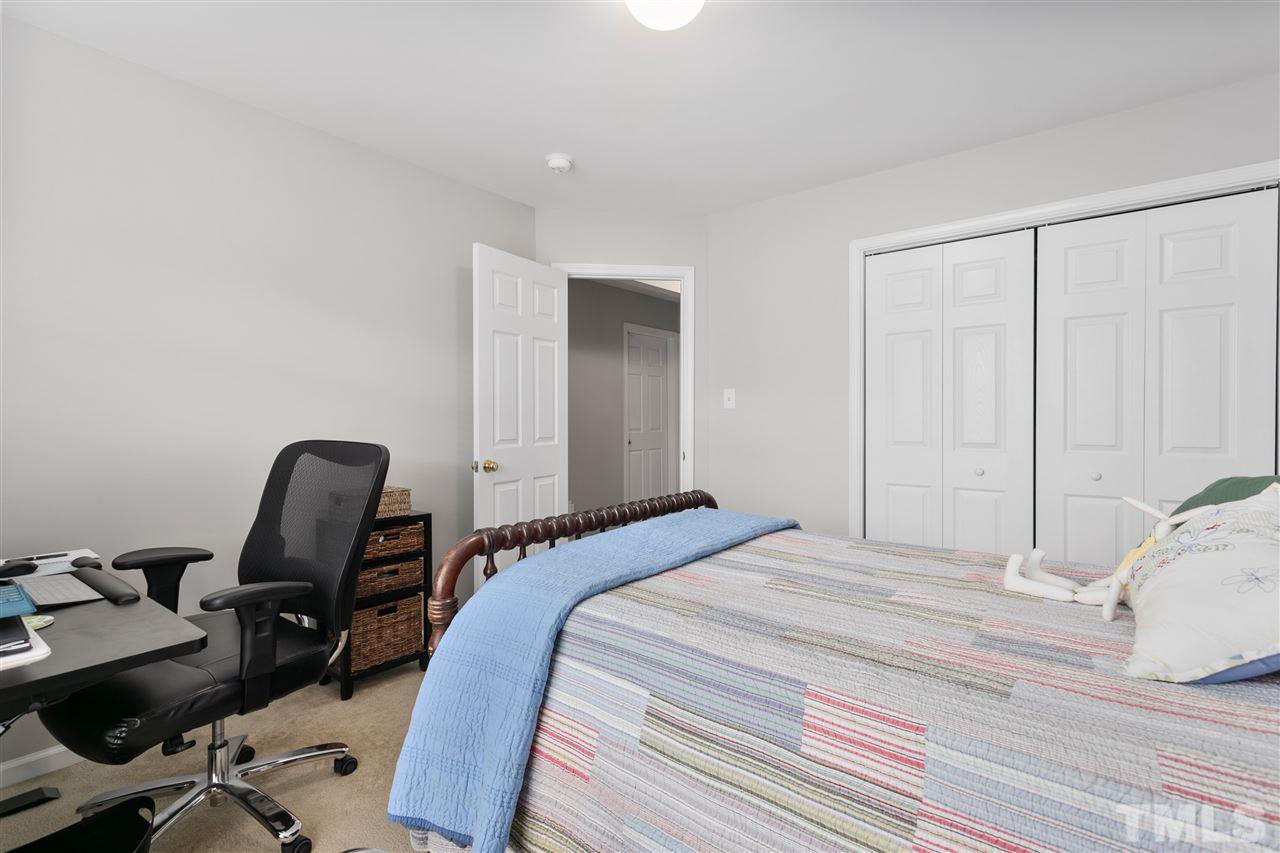 2744 Andover Glen Road Raleigh, NC 27604 - Photo 16 of 29 a bedroom with a workspace