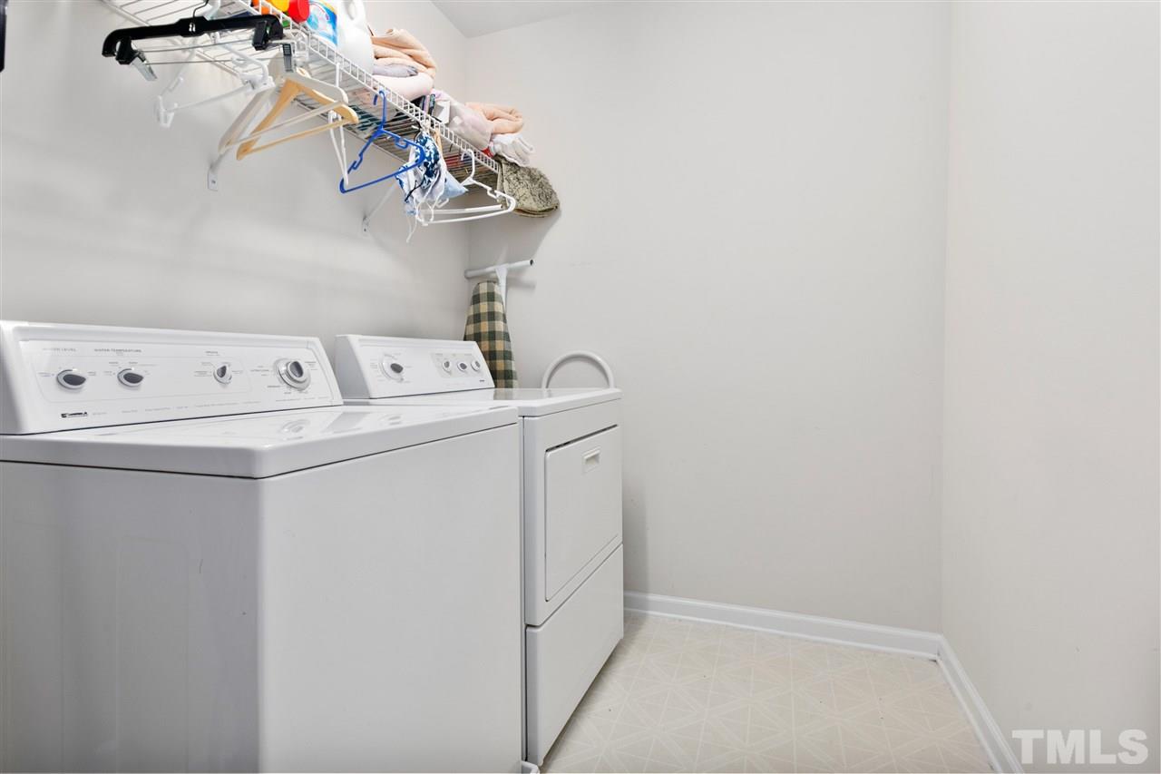 2744 Andover Glen Road Raleigh, NC 27604 - Photo 17 of 29 a utility room with dryer and washer