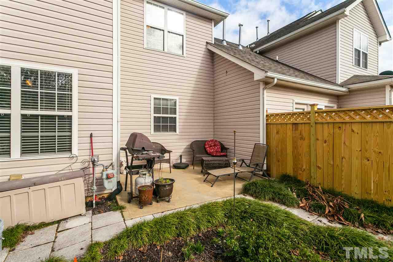 2744 Andover Glen Road Raleigh, NC 27604 - Photo 27 of 29 a backyard of a house with outdoor seating