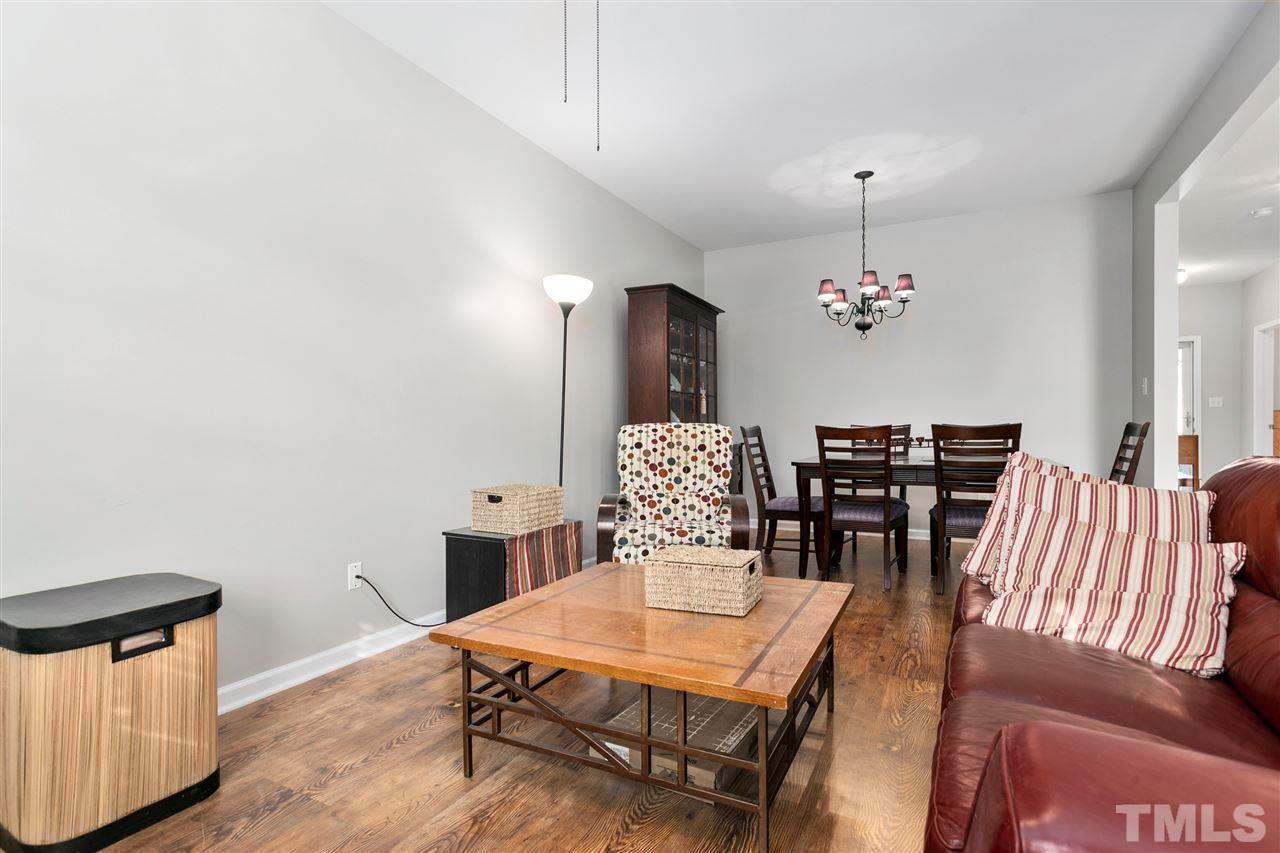 2744 Andover Glen Road Raleigh, NC 27604 - Photo 8 of 29 a view of a dining room with furniture