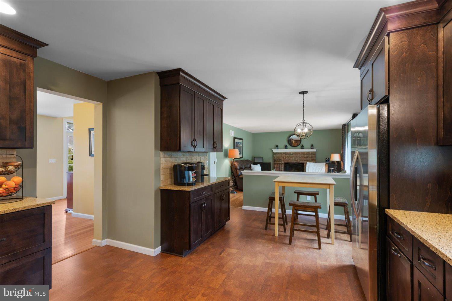 755 Farnum Road Lititz, PA 17543 - Photo 25 of 51 a kitchen with stainless steel appliances kitchen island granite countertop a refrigerator and a stove top oven
