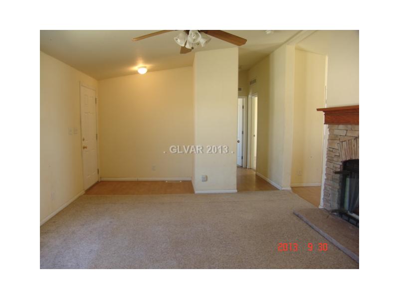 4921 West Dyer Road Pahrump, NV 89048 - Photo 3 of 19 Living Room.