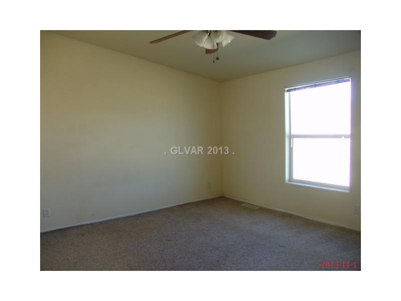 4921 West Dyer Road Pahrump, NV 89048 - Photo 8 of 19 Master Bedroom.