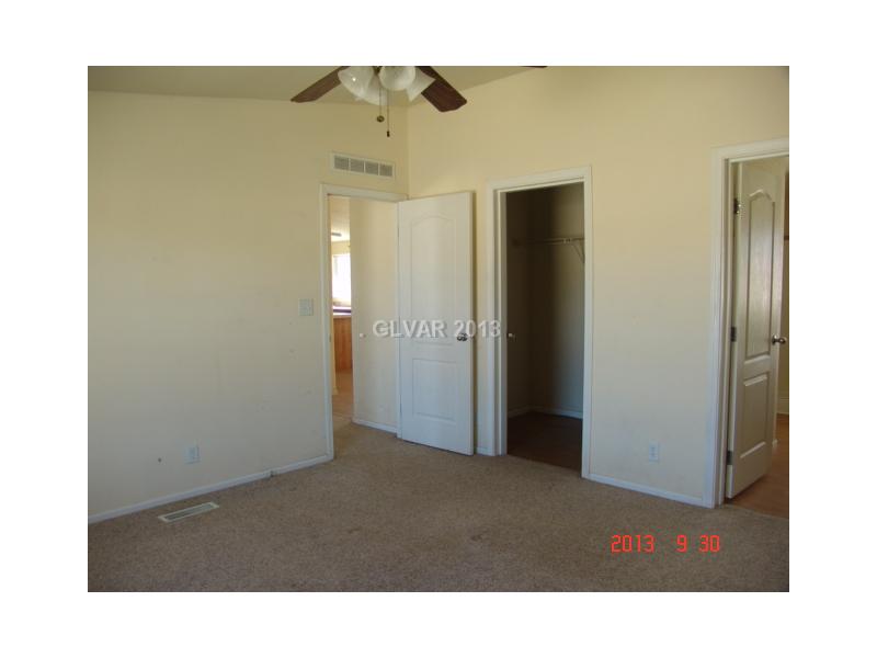 4921 West Dyer Road Pahrump, NV 89048 - Photo 9 of 19 Master Bedroom.