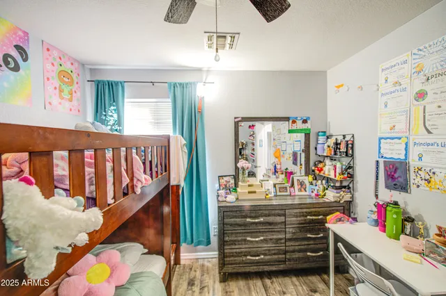 a view of livingroom with furniture and toys