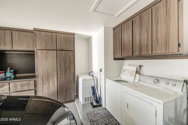 a kitchen with a sink and a refrigerator