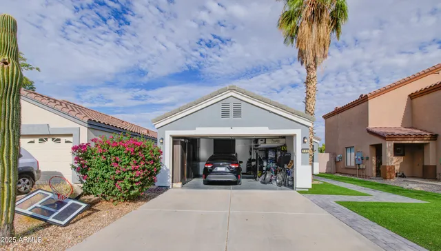 a view of a car parked in front of house