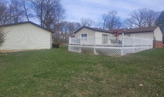 574 Christopher Road Jackson, MI 49203 - Photo 3 of 23 rear view