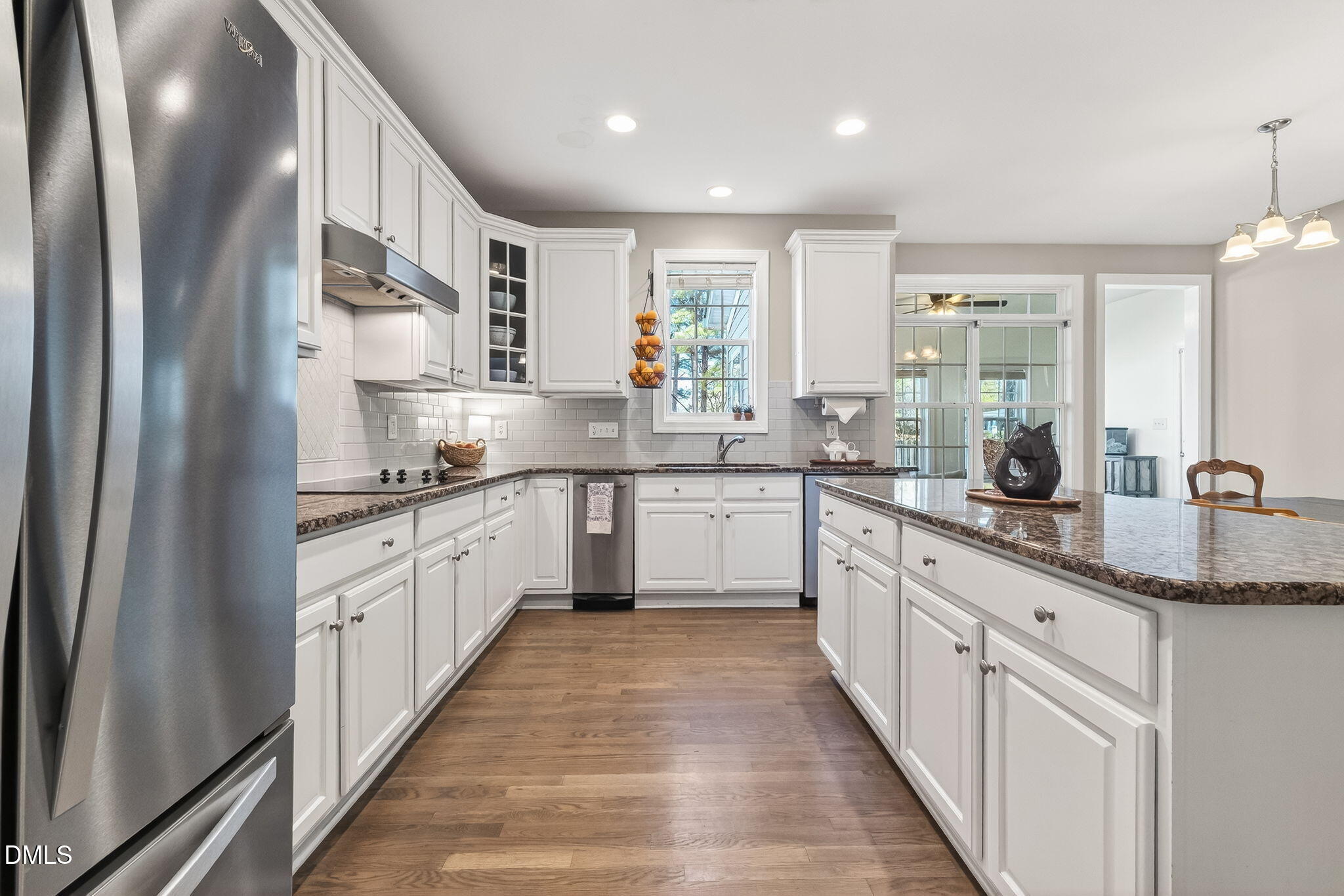 625 Toledo Court Rolesville, NC 27571 - Photo 22 of 69 a large kitchen with stainless steel appliances lots of counter space sink and a mirror
