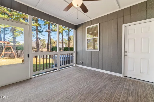 a spacious bathroom with a double vanity sink and a mirror
