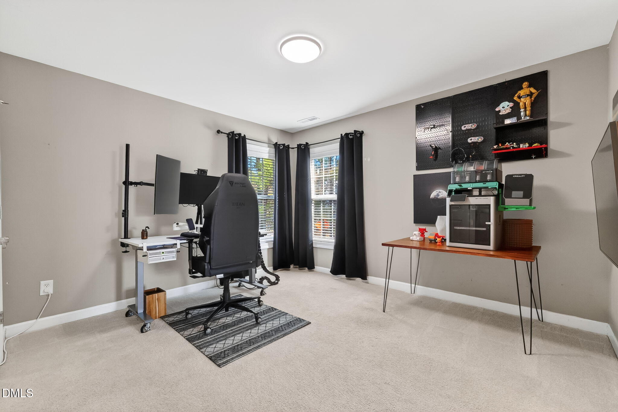 625 Toledo Court Rolesville, NC 27571 - Photo 45 of 69 a living room with furniture and a flat screen tv