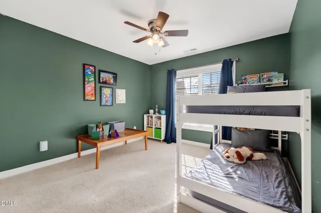 a view of a backyard with sitting area