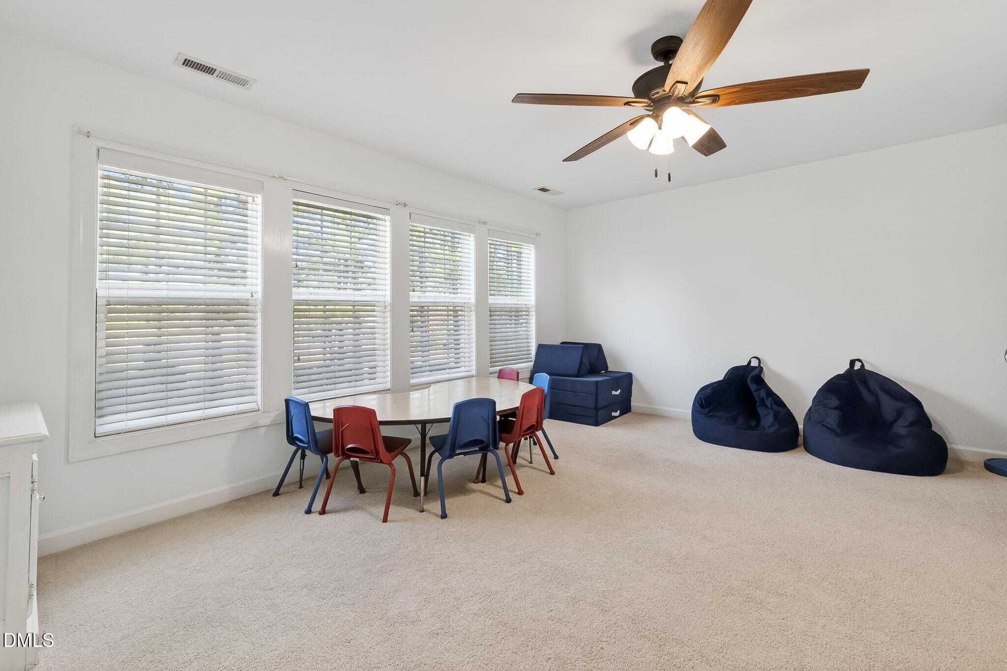 625 Toledo Court Rolesville, NC 27571 - Photo 49 of 69 a living room with furniture and a large window
