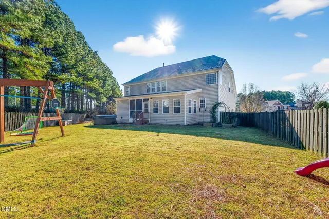 a view of a lake with a yard