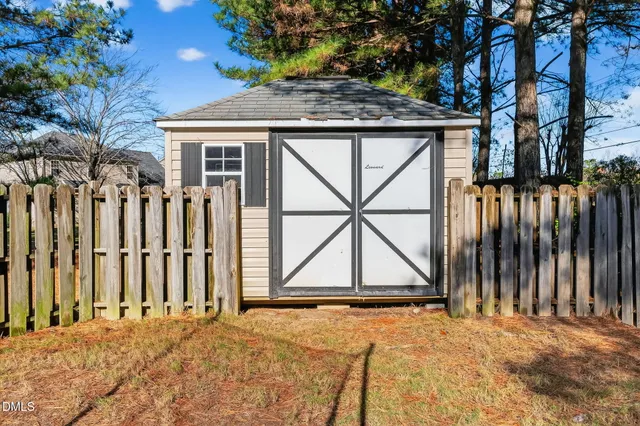 a view of a lake with huge green field