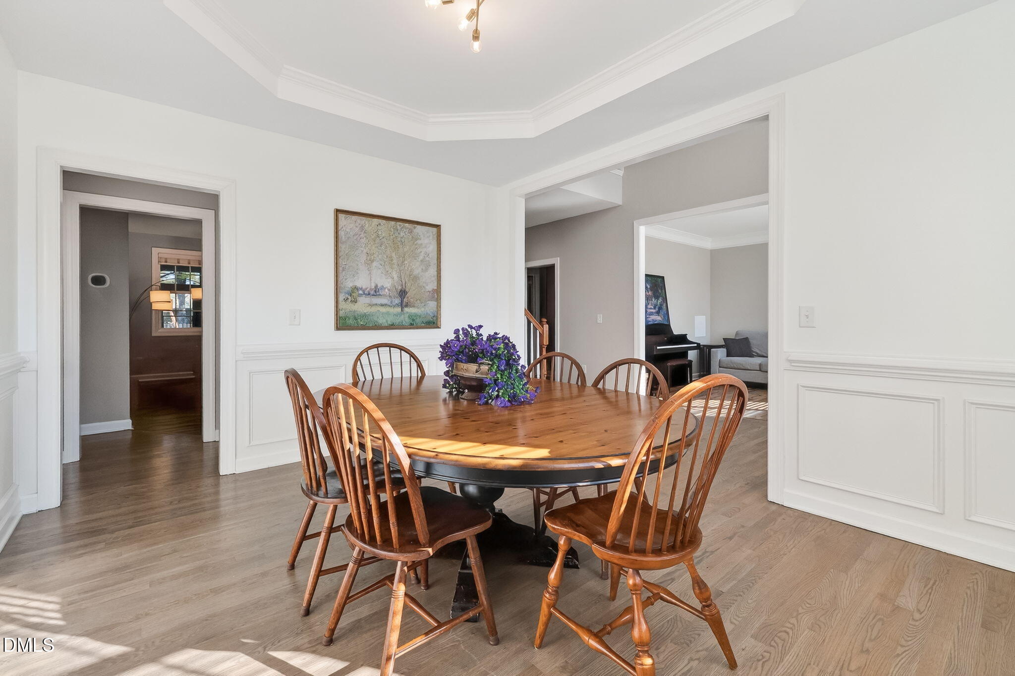 625 Toledo Court Rolesville, NC 27571 - Photo 8 of 69 a view of a dining room with furniture and wooden floor
