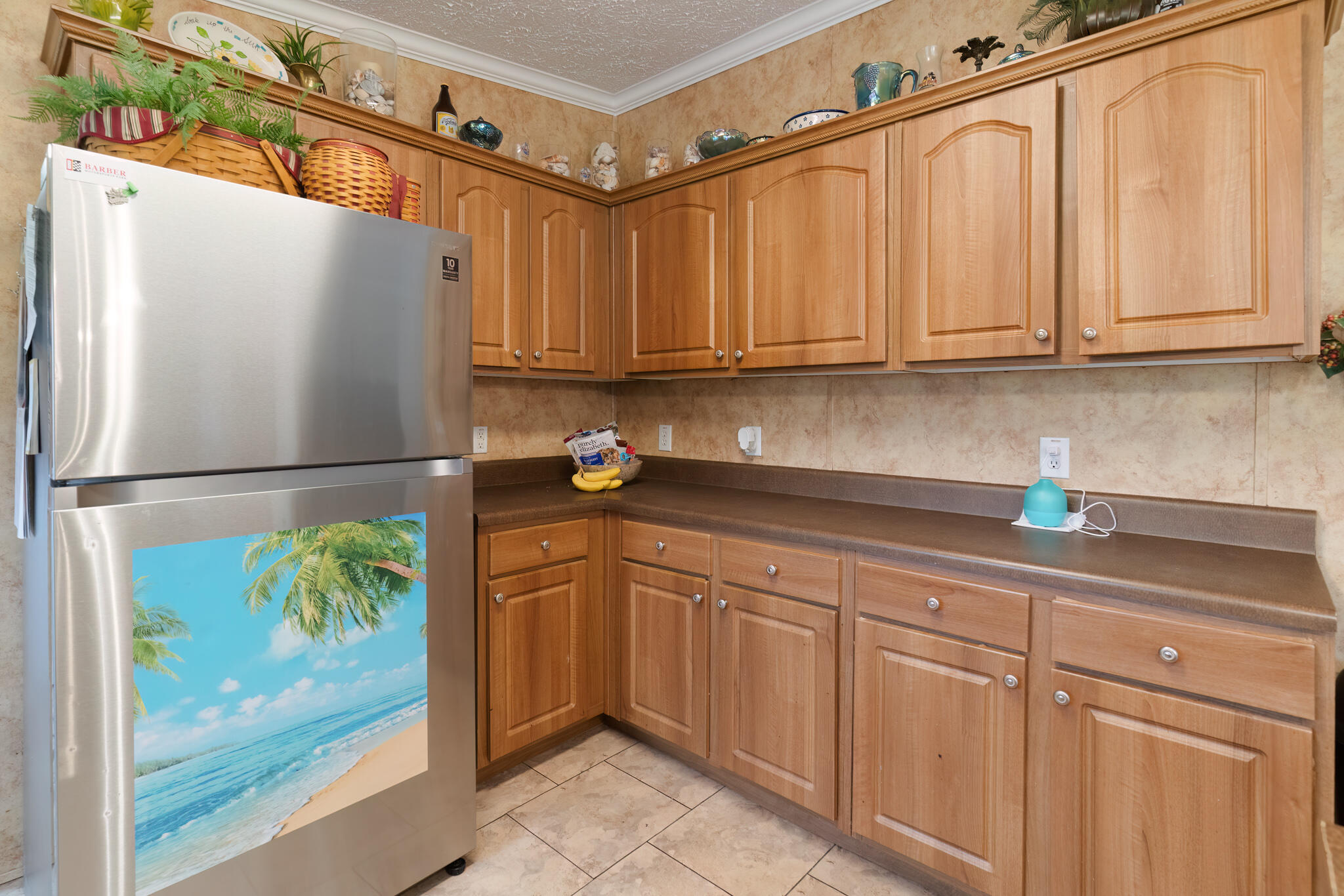 2050 Shockley Springs Road Baker, FL 32531 - Photo 11 of 49 a kitchen with stainless steel appliances granite countertop a refrigerator and a sink