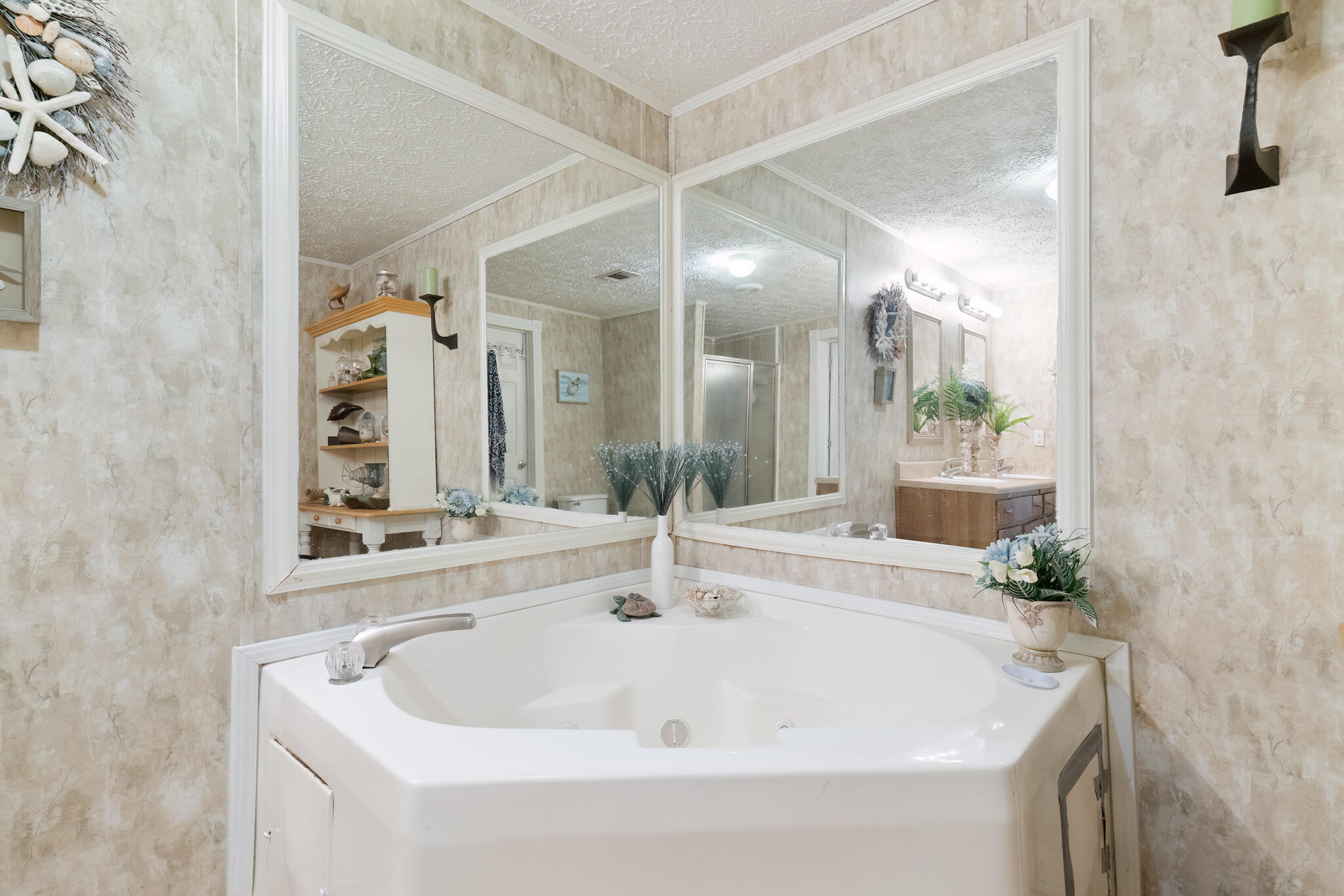 2050 Shockley Springs Road Baker, FL 32531 - Photo 19 of 49 a bathroom with a sink and a mirror