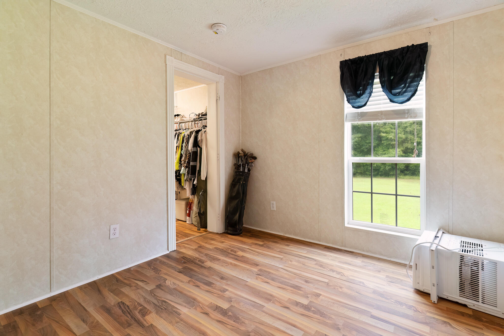 2050 Shockley Springs Road Baker, FL 32531 - Photo 21 of 49 a view of a livingroom with a window