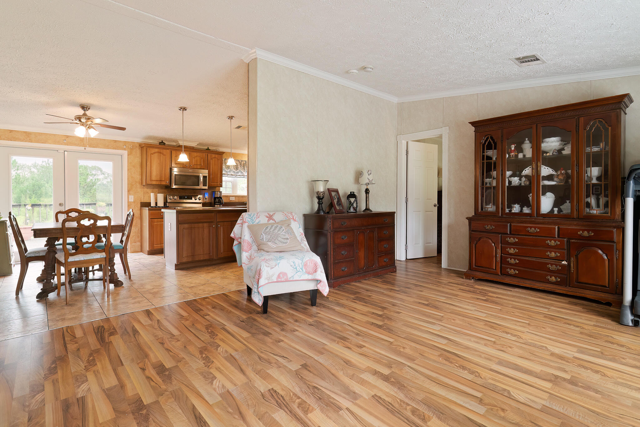 2050 Shockley Springs Road Baker, FL 32531 - Photo 31 of 49 a living room with furniture and wooden floor
