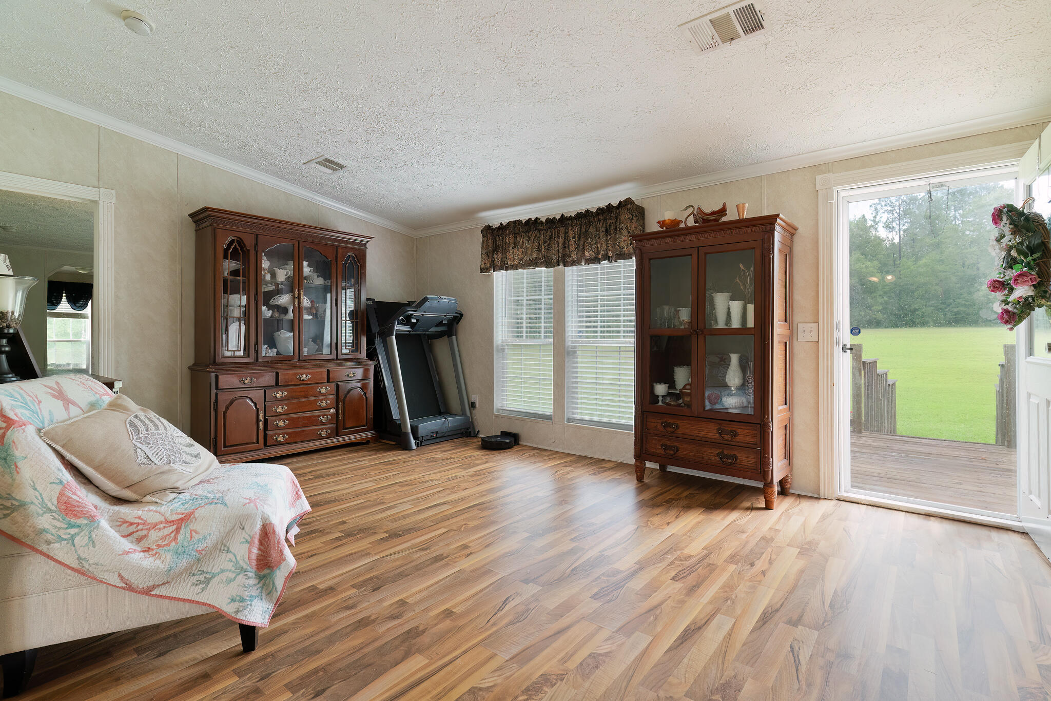 2050 Shockley Springs Road Baker, FL 32531 - Photo 32 of 49 a living room with furniture and a window