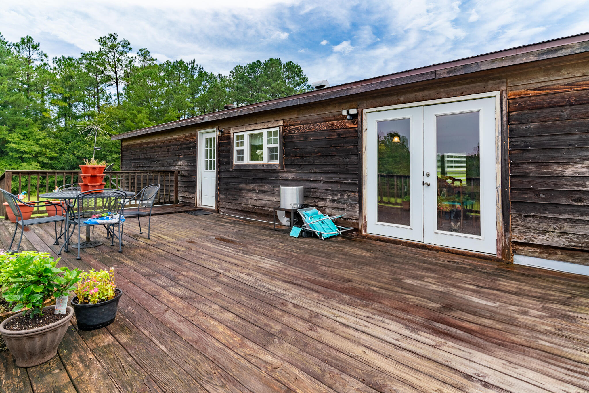 2050 Shockley Springs Road Baker, FL 32531 - Photo 33 of 49 a front view of a house with patio