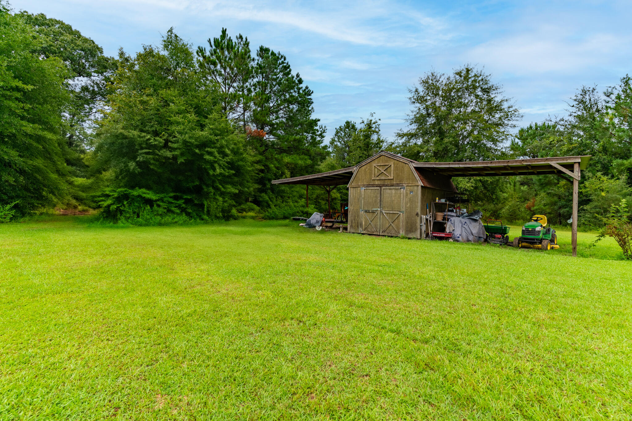 2050 Shockley Springs Road Baker, FL 32531 - Photo 35 of 49 a garden view