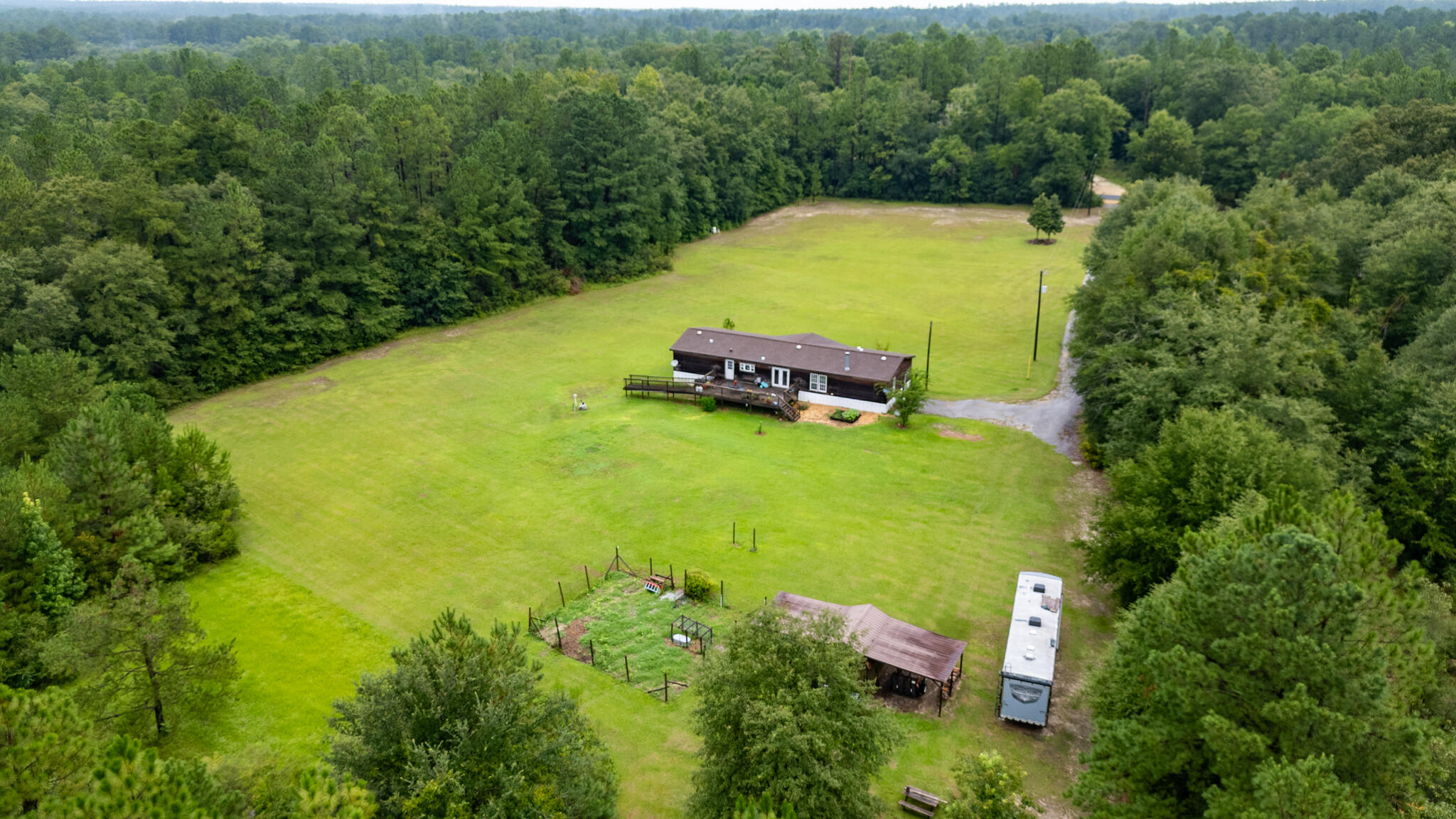 2050 Shockley Springs Road Baker, FL 32531 - Photo 4 of 49 an aerial view of a houses with yard