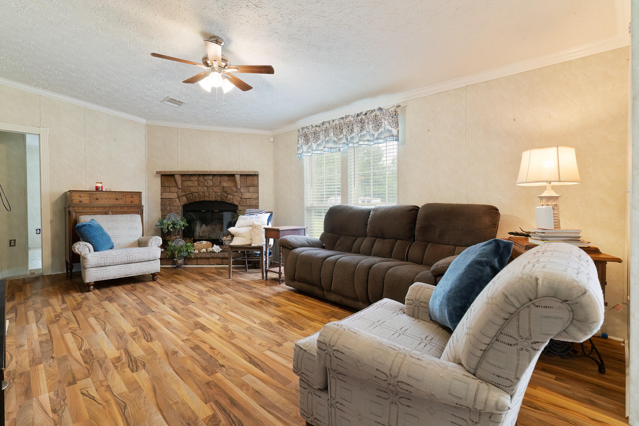 2050 Shockley Springs Road Baker, FL 32531 - Photo 7 of 49 a living room with furniture and a fireplace