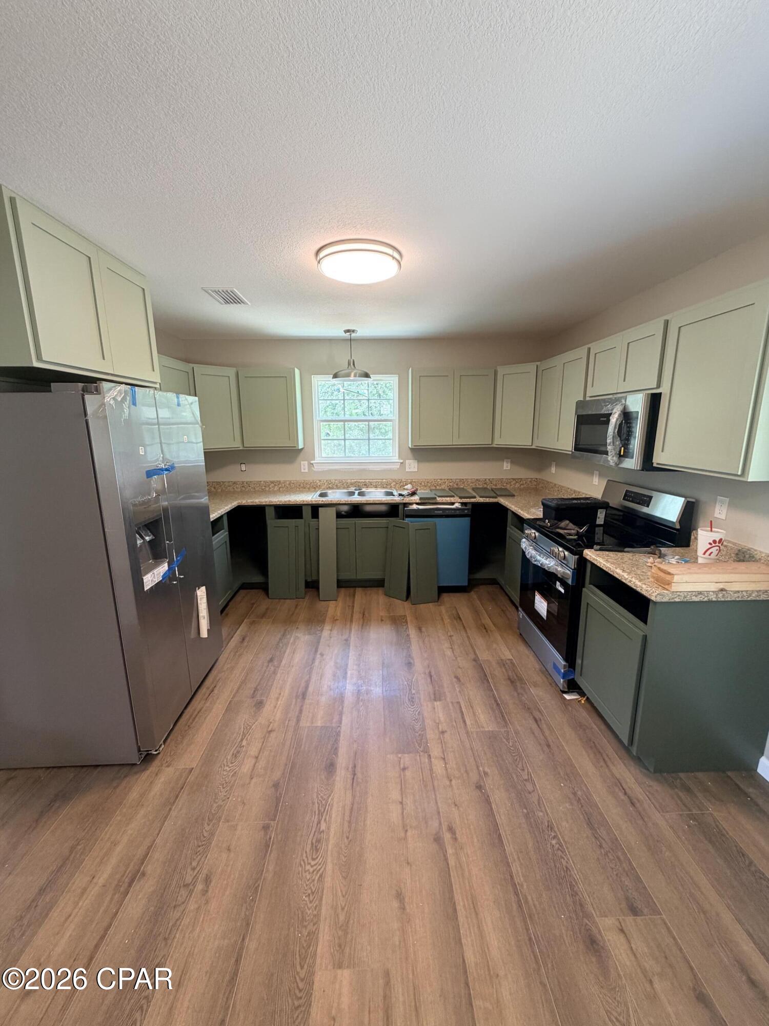 6642 Grande Oak Loop Grand Ridge, FL 32442 - Photo 3 of 9