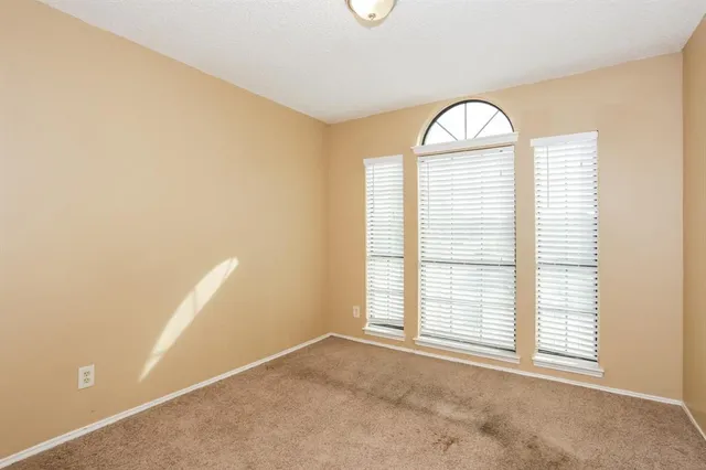 a view of a room with windows