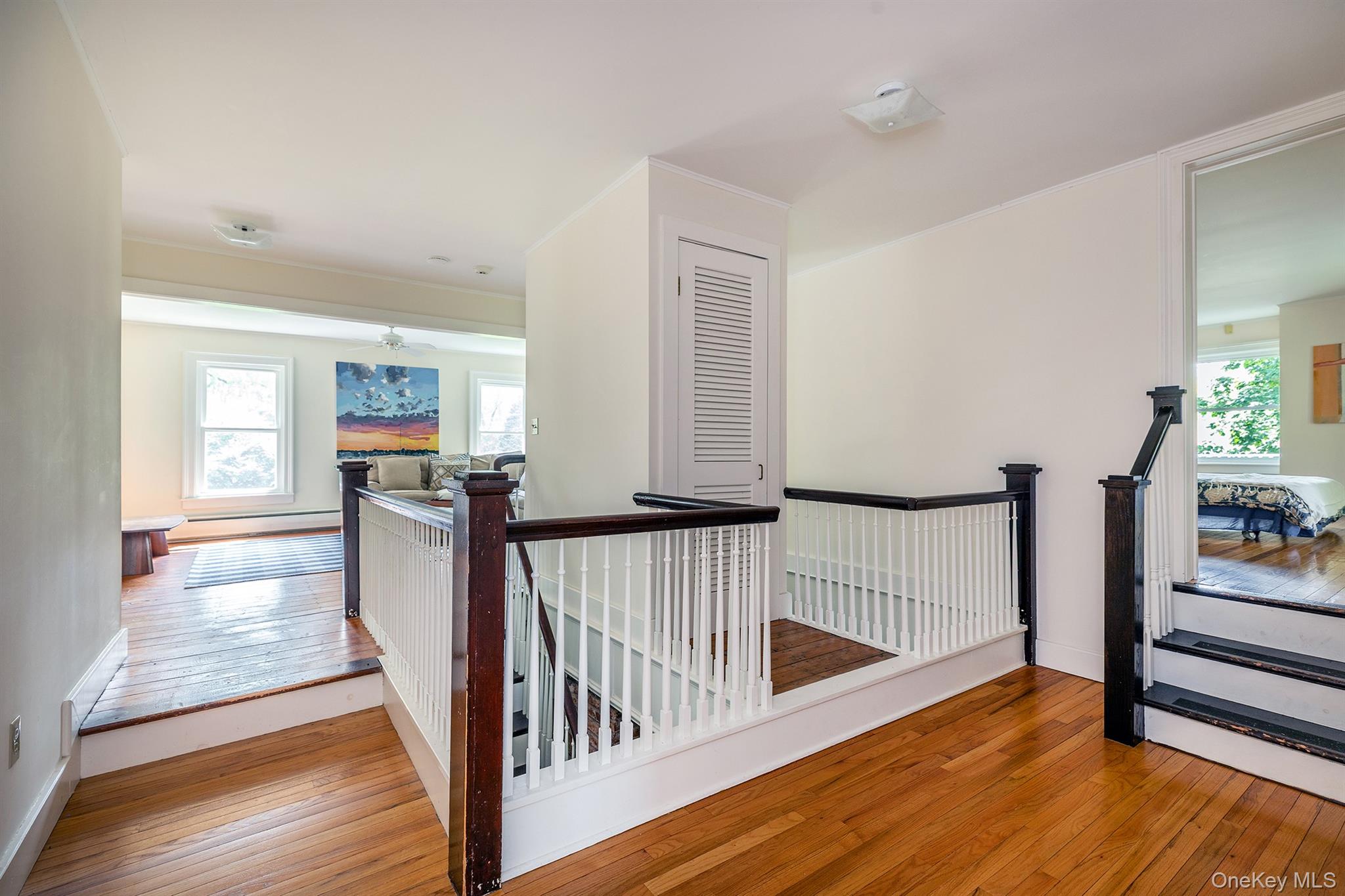 202 Buckwheat Road Hudson, NY 12534 - Photo 20 of 49 a view of a hallway with wooden floor and windows
