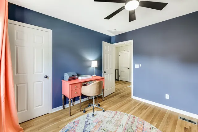 a view of a swimming pool with a porch