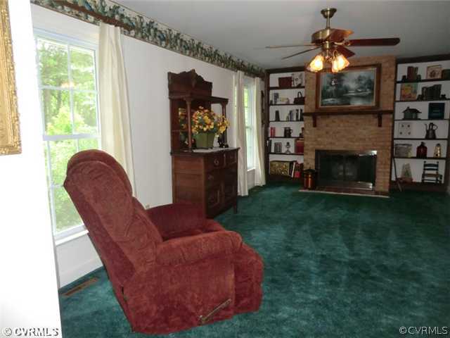 151 Petersburg Road Powhatan, VA 23139 - Photo 5 of 12 Living Room - Living Room has Gas Brick Fireplace