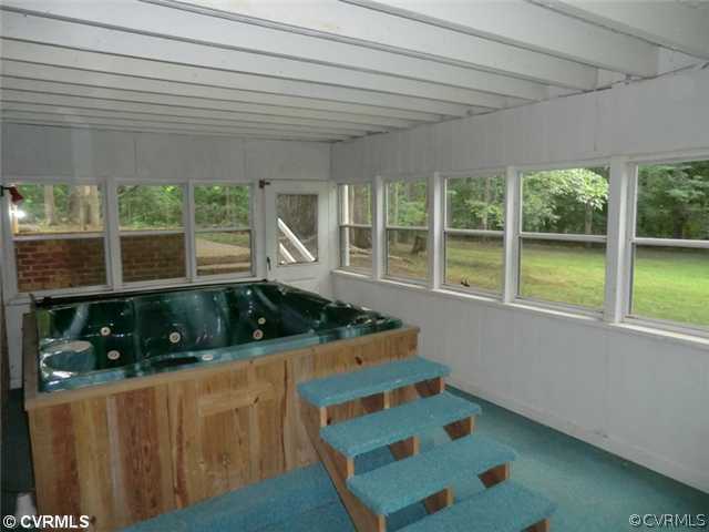 151 Petersburg Road Powhatan, VA 23139 - Photo 10 of 12 Patio/Deck - Lower-Level Enclosed SunRoom has Fabu
