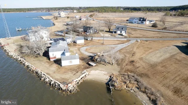 a living room with furniture fireplace and flat screen tv