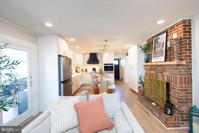 a view of a hallway with wooden shelves