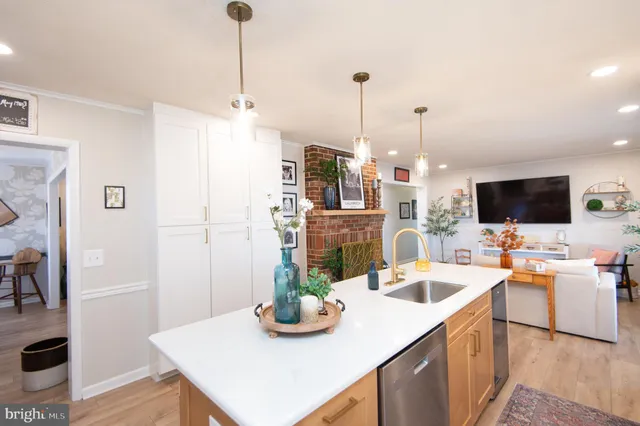 a bedroom with a bed and a baby crib